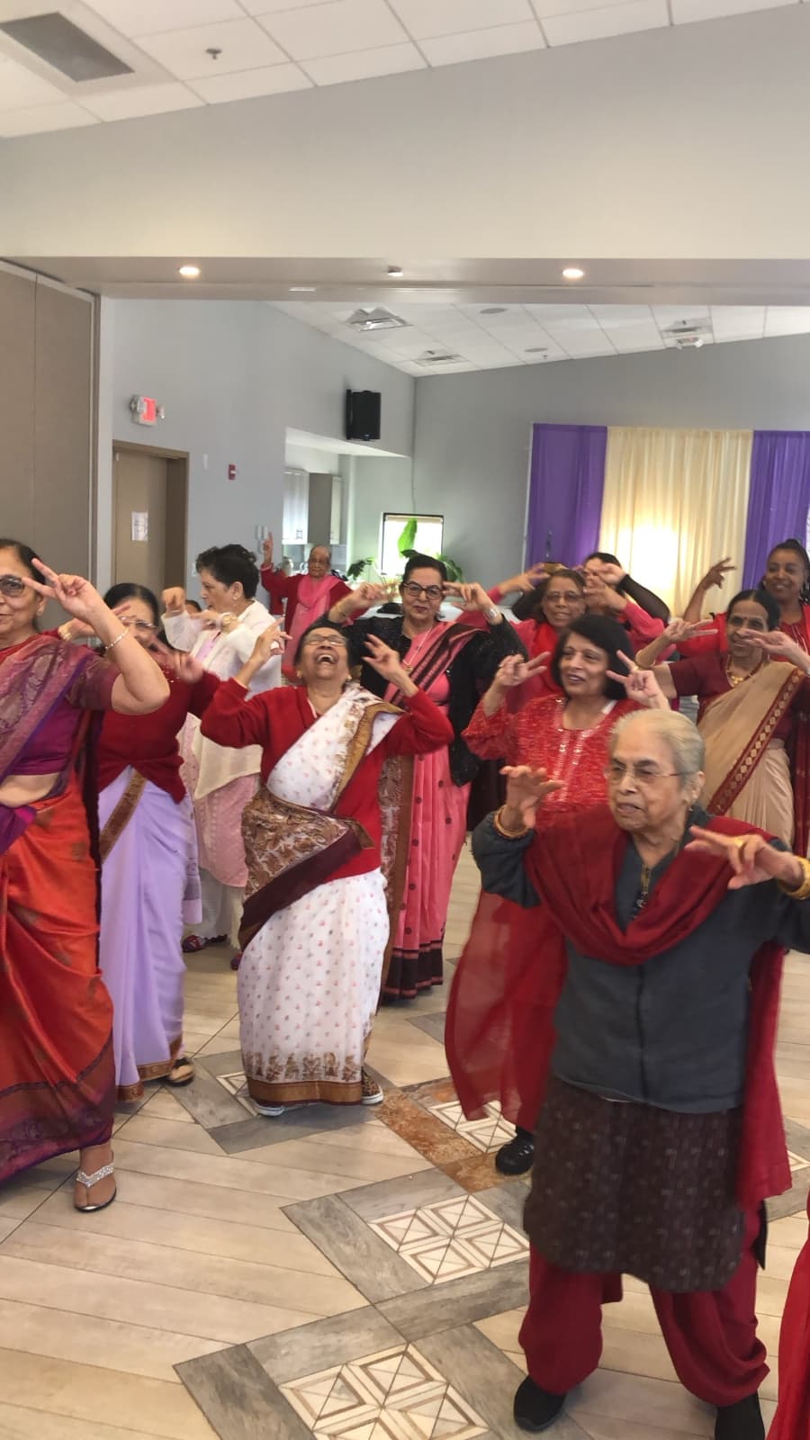 Seniors celebrating together at a Seva community gathering